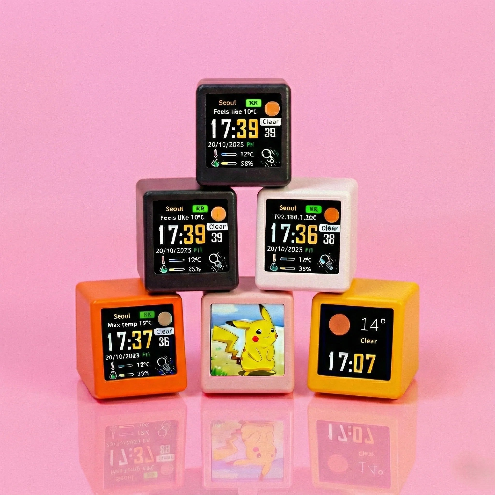 Stack of colorful digital clocks with various displays on a pink background